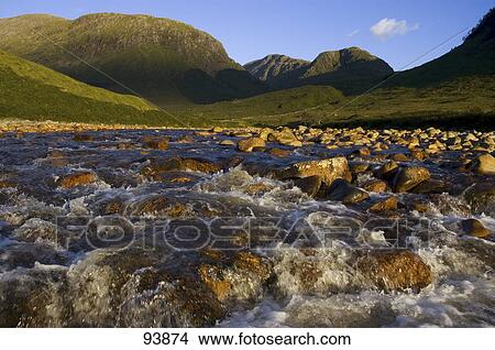 Picture - Stream flowing through rocks, Glen Etive, Scotland . Fotosearch