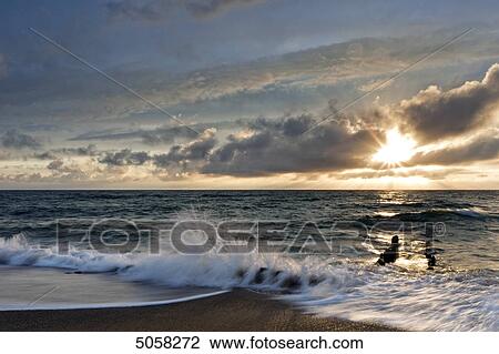 Stock Image - Sunset at North Sea, Sylt, Schleswig-Holstein, Germany, Europe . Fotosearch