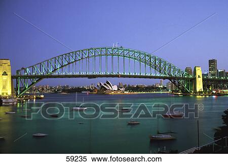 Stock Photography - Sydney Harbor bridge at dusk, New South Wales, Sydney, Australia, Europe . Fotosearch