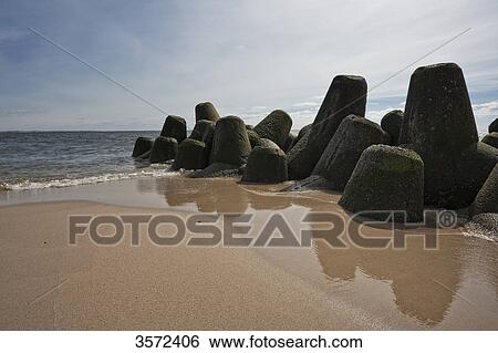 Tetrapodes at the coast at Hoernum, Sylt, Germany View Large Photo Image Stock Photograph - Tetrapodes at the coast at Hoernum, Sylt, Germany . Fotosearch