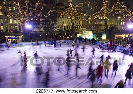 Tourists ice skating in rink, National History Museum, City Of London, Greater London, England View Large Photo Image Stock Photo - Tourists ice skating in rink, National History Museum, City Of London, Greater London, England . Fotosearch
