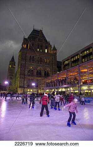 Tourists ice skating in rink, National History Museum, City Of London, Greater London, England View Large Photo Image Stock Photo - Tourists ice skating in rink, National History Museum, City Of London, Greater London, England . Fotosearch