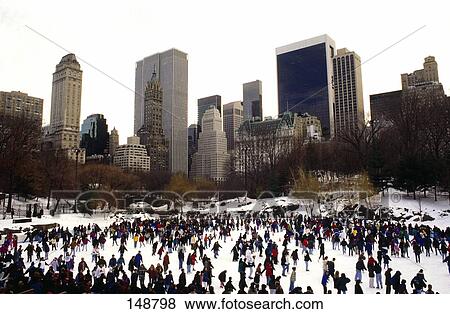 Stock Photo - Tourists skating in ice rink, Wollman Skating Rink, Central Park, Manhattan, New York City, New York State, USA . Fotosearch