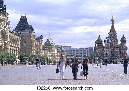 Tourists with church at town square, St. Basil's Cathedral, Red Square, Moscow Russia View Large Photo Image Stock Photo - Tourists with church at town square, St. Basil's Cathedral, Red Square, Moscow Russia . Fotosearch