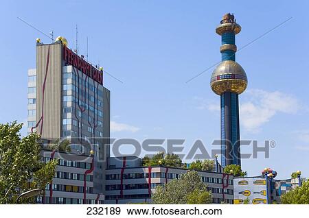 Tower with apartment building in city, Hundertwasserhaus, Vienna, Austria View Large Photo Image Stock Photo - Tower with apartment building in city, Hundertwasserhaus, Vienna, Austria . Fotosearch