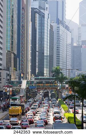 Stock Image - Traffic on road, Wanchai, Hong Kong, China . Fotosearch