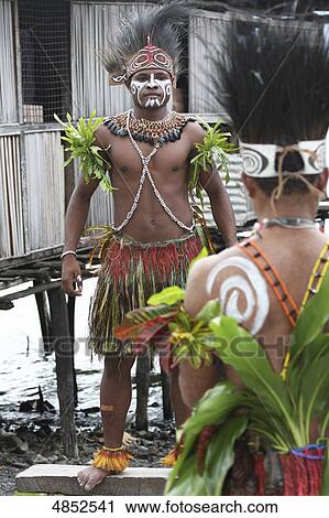 Two male dancers, Jayapura, Provinz Papua, Indonesia, Asia  View Large Photo Image Stock Image - Two male dancers, Jayapura, Provinz Papua, Indonesia, Asia . Fotosearch