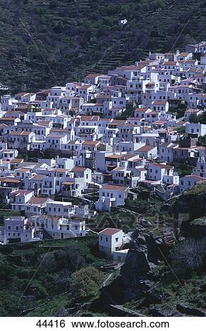 Stock Photograph - Village at hillside, Greece . Fotosearch