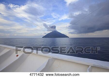 Stock Image - Volcano eruption of the Batu Tara, Flores Sea, Indonesia . Fotosearch