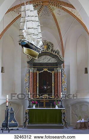 Votivship and altar in a church, Neuharlingersiel, Germany View Large Photo Image Stock Image - Votivship and altar in a church, Neuharlingersiel, Germany . Fotosearch