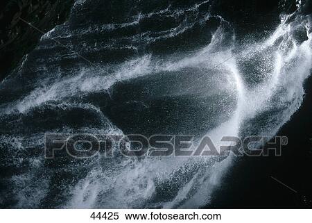 Stock Photography - Water flowing on rocks, Giessbach, Brienz, Bern Canton, Switzerland . Fotosearch