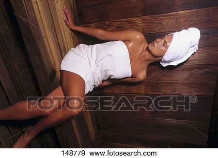 Woman taking sauna bath View Large Photo Image Stock Photo - Woman taking sauna bath . Fotosearch