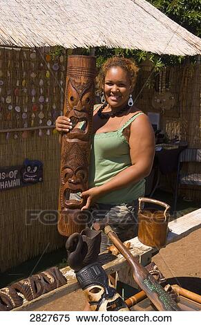 Stock Photography - Woman with art on Maui, Hawaii, USA . Fotosearch