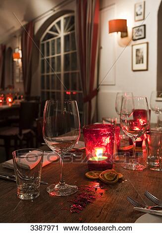 Wooden dining table in a restaurant View Large Photo Image Stock Image - Wooden dining table in a restaurant . Fotosearch