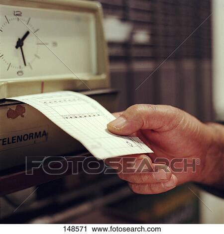 Worker holding pay slip, Germany View Large Photo Image Stock Image - Worker holding pay slip, Germany . Fotosearch