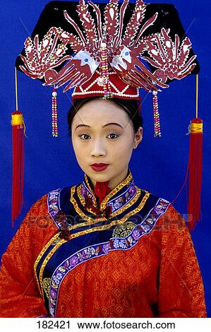 Young asian woman wearing traditional costume View Large Photo Image Stock Image - Young asian woman wearing traditional costume . Fotosearch