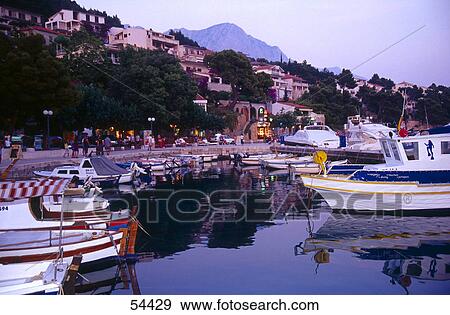 Stock Photo - Boats in harbor, Brela, Croatia . Fotosearch