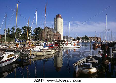 Boats moored at harbor, Fehmarn Island, Schleswig-Holstein, Germany View Large Photo Image Stock Photo - Boats moored at harbor, Fehmarn Island, Schleswig-Holstein, Germany . Fotosearch