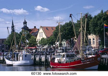 Boats moored at harbor, Molln, Schleswig-Holstein, Germany View Large Photo Image Stock Image - Boats moored at harbor, Molln, Schleswig-Holstein, Germany . Fotosearch