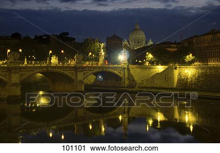 Stock Image - Bridge lit up at night, Ponte Sant Angelo, Tiber River, Rome, Italy . Fotosearch