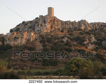 Building and tower on cliffs, Posada, Sardinia, Italy View Large Photo Image Stock Image - Building and tower on cliffs, Posada, Sardinia, Italy . Fotosearch