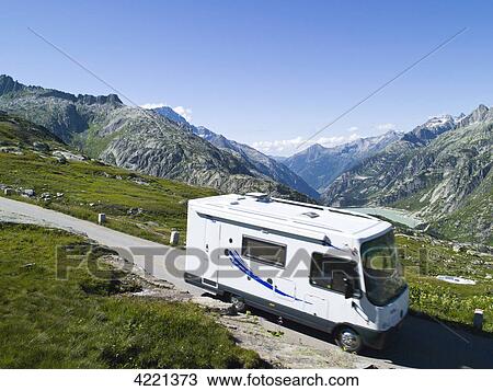 Camper on street, Oberaar, Swiss Alps, Switzerland View Large Photo Image Stock Image - Camper on street, Oberaar, Swiss Alps, Switzerland . Fotosearch