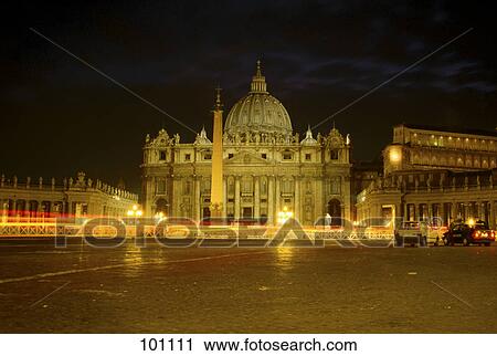 Stock Image - Cathedral lit at night, St. Peter's Basilica, St. Peter's Square, Vatican, Rome, Italy . Fotosearch
