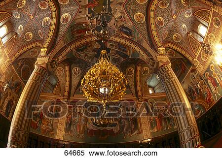 Stock Photography - Chandelier hanging on ceiling of church, Cyprus . Fotosearch