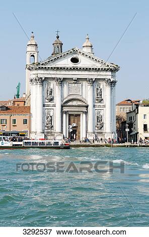 Stock Photo - Church at the waterfront of a canal, Venice, Italy . Fotosearch