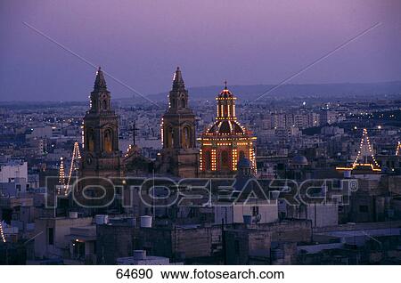 Church lit up in city at dusk, St. Mary Church, Sliema, Malta View Large Photo Image Stock Image - Church lit up in city at dusk, St. Mary Church, Sliema, Malta . Fotosearch