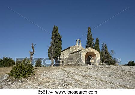 Church on landscape, St. Sixte, Alpilles, Provence-Alpes-Cote d'Azur, France View Large Photo Image Picture - Church on landscape, St. Sixte, Alpilles, Provence-Alpes-Cote d'Azur, France . Fotosearch