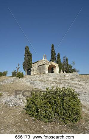 Church on landscape, St. Sixte, Alpilles, Provence-Alpes-Cote d'Azur, France View Large Photo Image Stock Image - Church on landscape, St. Sixte, Alpilles, Provence-Alpes-Cote d'Azur, France . Fotosearch