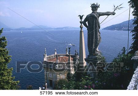Stock Photography - Close-up of an old sculpture overlooking the sea, Isola Bella, Borromean Islands, Italy . Fotosearch