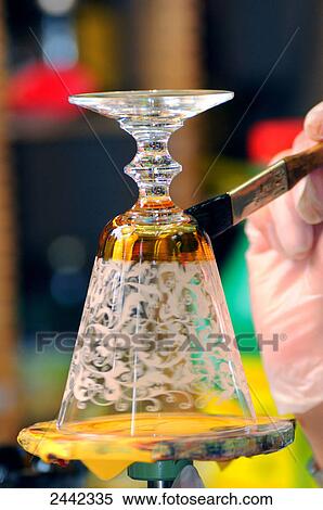 Close-up of person painting glass View Large Photo Image Stock Photography - Close-up of person painting glass . Fotosearch