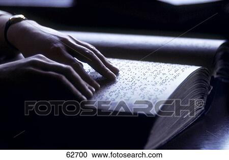 Close-up of person's hands reading Braille View Large Photo Image Stock Image - Close-up of person's hands reading Braille . Fotosearch