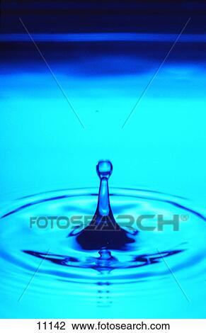 Close-up of water droplet creating ripples on water surface View Large Photo Image Stock Image - Close-up of water droplet creating ripples on water surface . Fotosearch