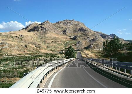 Country road running through landscape, Agrigento, Sicily, Italy View Large Photo Image Stock Photography - Country road running through landscape, Agrigento, Sicily, Italy . Fotosearch