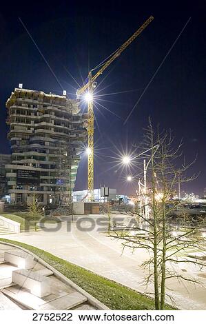 Cranes at construction site during night, Germany View Large Photo Image Stock Image - Cranes at construction site during night, Germany . Fotosearch