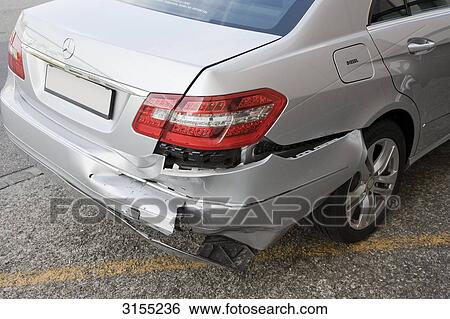 Stock Photograph - Damaged Mercedes, results of a rear-end collision, horizontal format . Fotosearch