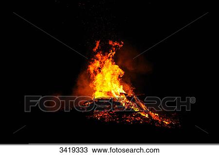 Stock Image - Fire at night . Fotosearch