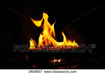 Firewood burning in an open fire, close-up View Large Photo Image Stock Photo - Firewood burning in an open fire, close-up . Fotosearch