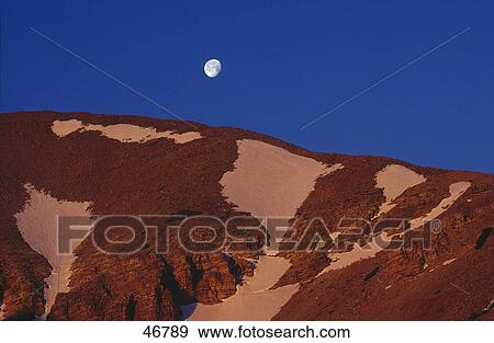 Full moon over mountain, Grand Canyon, Arizona, USA View Large Photo Image Stock Photo - Full moon over mountain, Grand Canyon, Arizona, USA . Fotosearch