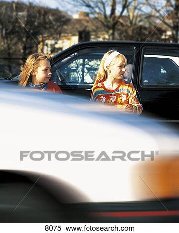 Girls crossing street  View Large Photo Image Stock Photography - Girls crossing street . Fotosearch