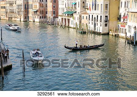 Gondola and boats on a canal, Venice, Italy, high angle view View Large Photo Image Stock Image - Gondola and boats on a canal, Venice, Italy, high angle view . Fotosearch