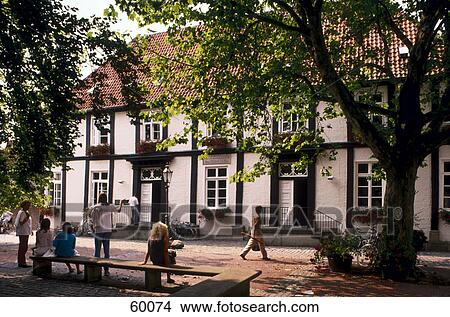 Picture - Group of people in front of house, Saxony, Germany, Europe . Fotosearch