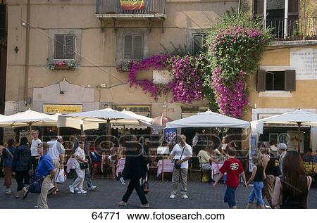 Group of tourists at market View Large Photo Image Stock Image - Group of tourists at market . Fotosearch