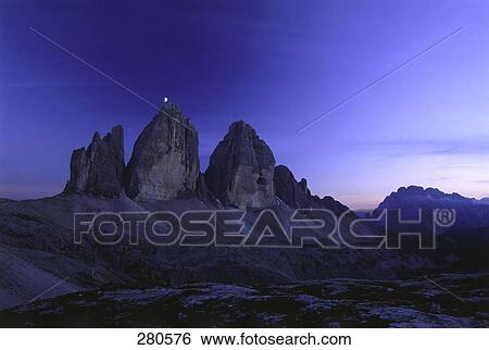 Half moon over mountains, Tre Cime di Lavaredo, Dolomites, Tyrol, Italy View Large Photo Image Stock Photograph - Half moon over mountains, Tre Cime di Lavaredo, Dolomites, Tyrol, Italy . Fotosearch