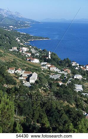 Stock Image - High angle view of a town at the coast, Makarska Riviera, Croatia . Fotosearch