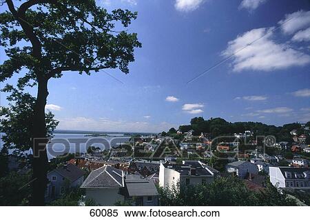 Stock Photography - High angle view of houses in town at coast, Elbe River, Blankenese, Hamburg, Germany . Fotosearch