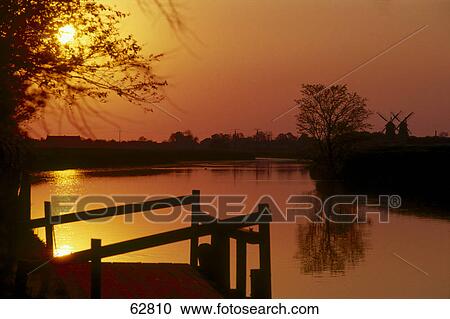 Lake at sunset, Lower Saxony, Germany, Europe View Large Photo Image Stock Image - Lake at sunset, Lower Saxony, Germany, Europe . Fotosearch